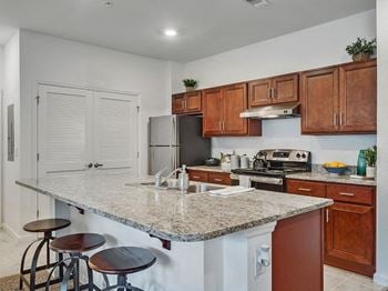 Fully-appointed designer kitchen with granite countertops